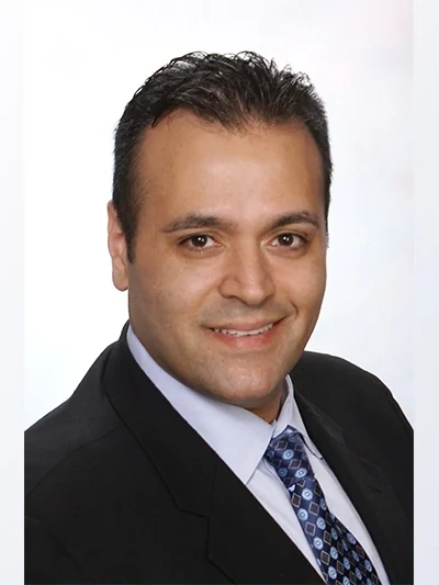 Dr. Roger Nouneh, DDS, of Designer Smiles.